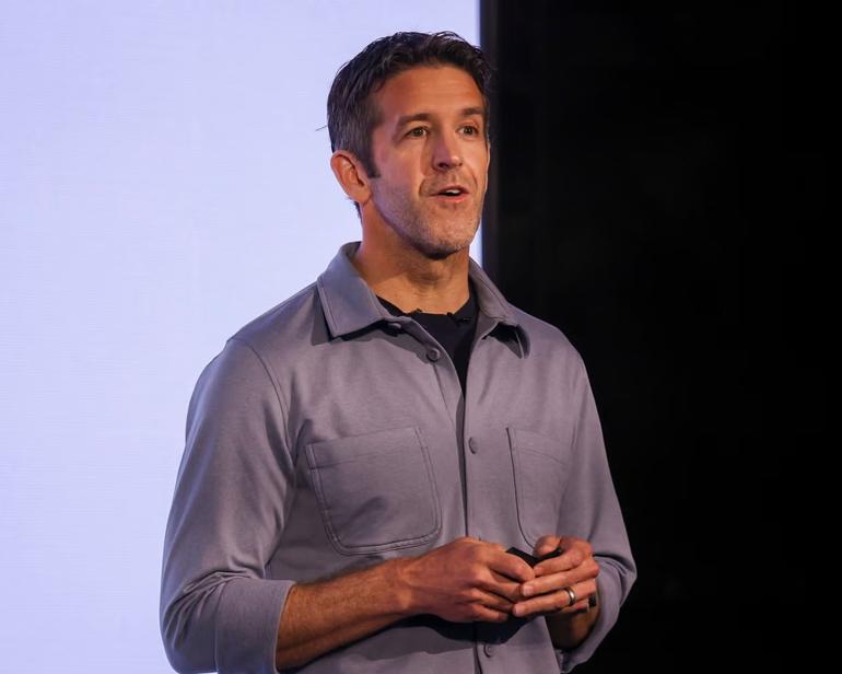 John Ternus announces new Apple products, including the MacBook Neo, in New York in March. Ternus started at Apple in 2001. Photograph: Sarah Yenesel/EPA