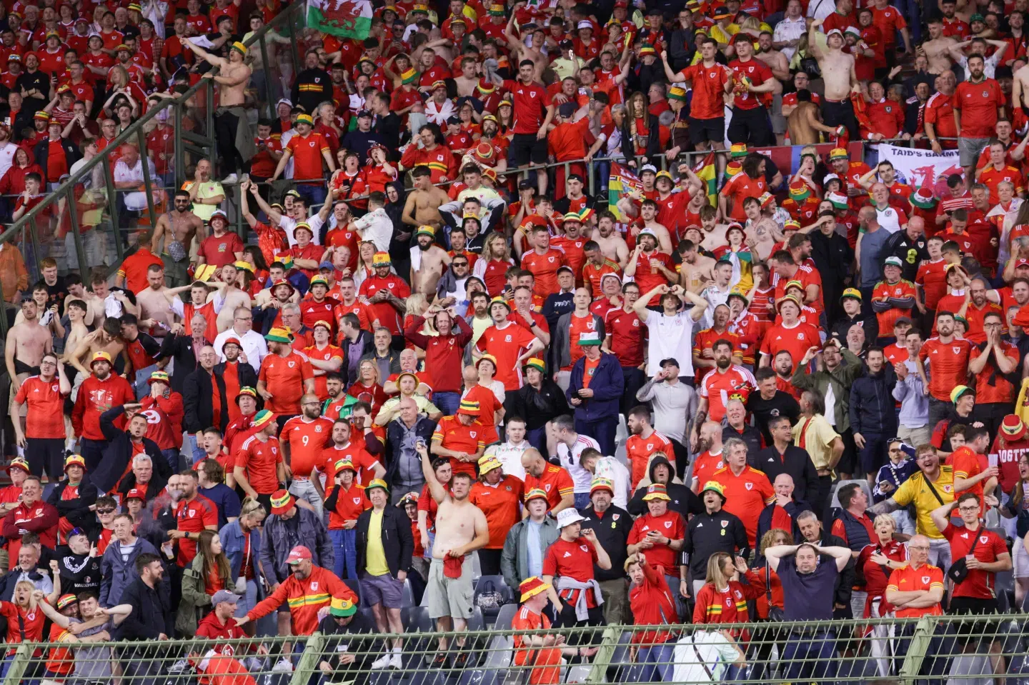 Football fan rushed to hospital after falling from upper stands during wild celebrations