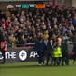 Exeter vs Forest: Ambulance crew rushes to aid Awoniyi after bloody on-pitch collision. Photo credit: ITV