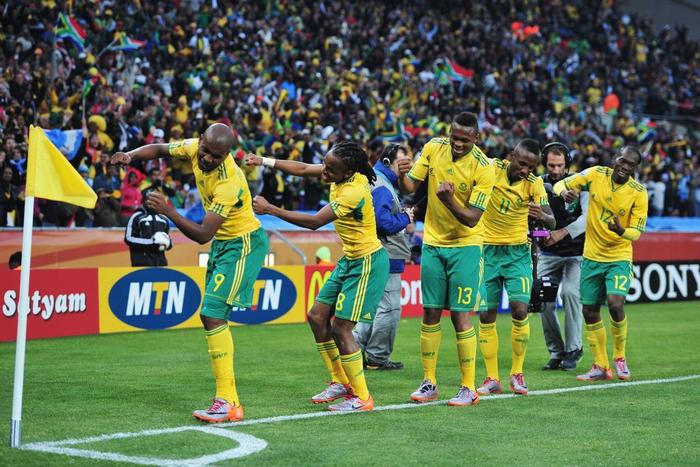 South Africa's Siphiwe Tshabalala (No. 8) celebrates with teammates after scoring against Mexico in the opening fixture of the 2010 World Cup in Johannesburg, South Africa. Clive Mason/Getty Images