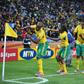 South Africa's Siphiwe Tshabalala (No. 8) celebrates with teammates after scoring against Mexico in the opening fixture of the 2010 World Cup in Johannesburg, South Africa. Clive Mason/Getty Images