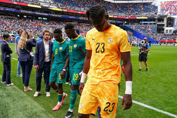 Senegal 'devastated' after late World Cup collapse against Belgium | AP News