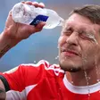 Belotti #19 of SL Benfica pours water on his face during the FIFA Club World Cup 2025 round of 16 match between SL Benfica and Chelsea FC at Bank of America Stadium (Photo by Justin Setterfield - FIFA/FIFA via Getty Images)