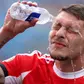 Belotti #19 of SL Benfica pours water on his face during the FIFA Club World Cup 2025 round of 16 match between SL Benfica and Chelsea FC at Bank of America Stadium (Photo by Justin Setterfield - FIFA/FIFA via Getty Images)