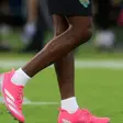Why are players wearing pink boots at the 2026 FIFA World Cup?