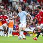 Manchester City forward Erling Haaland (9) battles with Manchester United midfielder Bruno Fernandes (8) during the Manchester United v Manchester City Premier League match at Old Trafford. Photo via Phil Duncan Every Second Media (IMAGO)