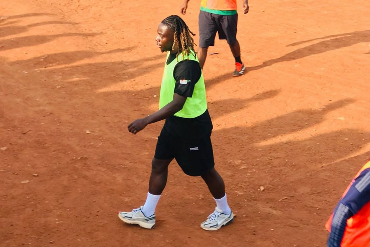 Jeremy Doku wows locals with fancy tricks on dusty Madina pitch in Ghana (Video)