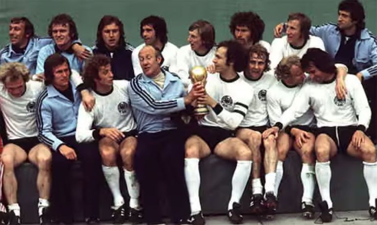 The West Germans celebrate their 1974 triumph. Photograph: Empics/Wilfried Witters