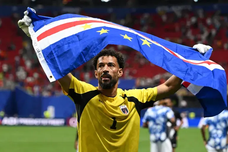 Cape Verde's goalkeeper, Vozinha, celebrates with his national flag at the end of the 2026 World Cup Group H football match between Spain and Cape Verde at Atlanta Stadium in Atlanta on June 15, 2026 [AFP]