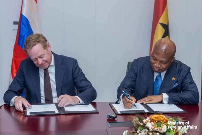 Foreign Affairs Minister, Samuel Okudzeto Ablakwa (right) signing the agreement with Dutch Minister for Justice and Security, David Van Weel (left) during his official visit to Ghana.