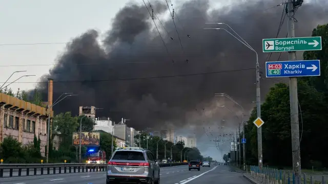 Smoke rises over the city after a Russian attack on Kyiv, Ukraine, Ukraine, Sunday, July 19, 2026. (AP Photo/Efrem Lukatsky)