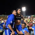 Curaçao players and fans celebrate World Cup 2026 qualification after a 0-0 draw with Jamaica at the National Stadium in Kingston, Jamaica on November 18, 2025. (AFP Photo)
