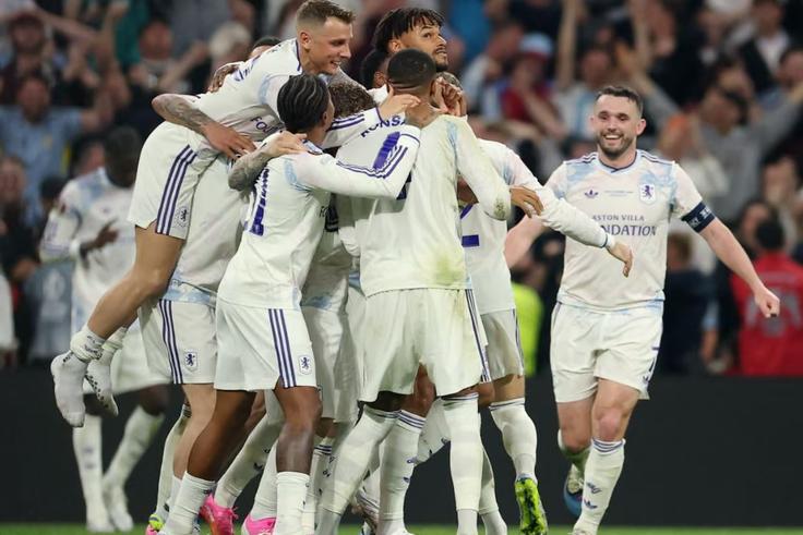 ston Villa players celebrate after winning the Europa League. Photograph: Isabel Infantes/Reuters