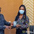Foreign Affairs Ministry presents first 100 free replacement passports to Accra flood victims