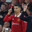 Soccer Football - Premier League - Manchester United v Liverpool - Old Trafford, Manchester, Britain - August 22, 2022 Manchester United's Cristiano Ronaldo with manager Erik ten Hag before coming on as a substitute REUTERS/Phil Noble