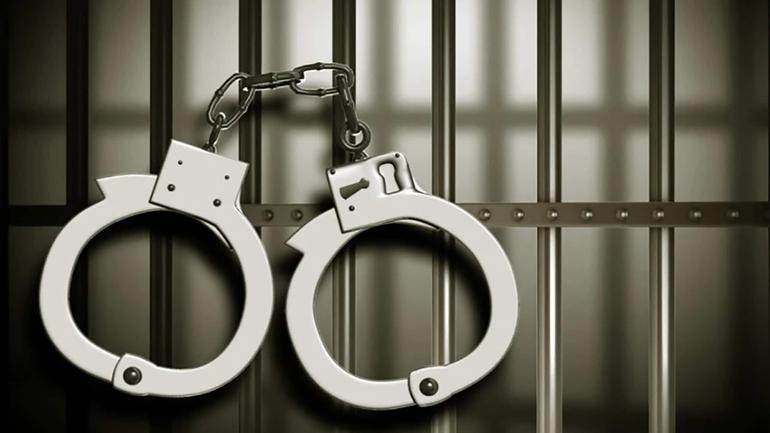 An image of a handcuff to illustrate and arrest