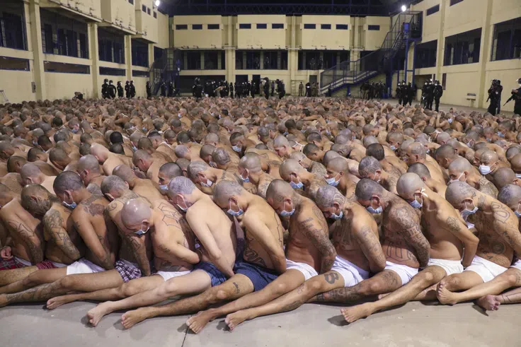 Inmates are lined up during a security operation at the Izalco prison in San Salvador, El Salvador, on April 25, 2020. El Salvador Presidency Press Office / AP