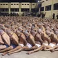 Inmates are lined up during a security operation at the Izalco prison in San Salvador, El Salvador, on April 25, 2020. El Salvador Presidency Press Office / AP