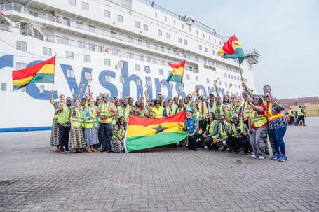 Mercy Ships staff and crew on the dock while the Global Mercy arrives at the Port of Tema in Ghana.