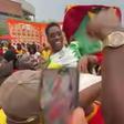 Ghanaians celebrate World Cup draw against England with a Nigerian in a joyful scene [Video]
