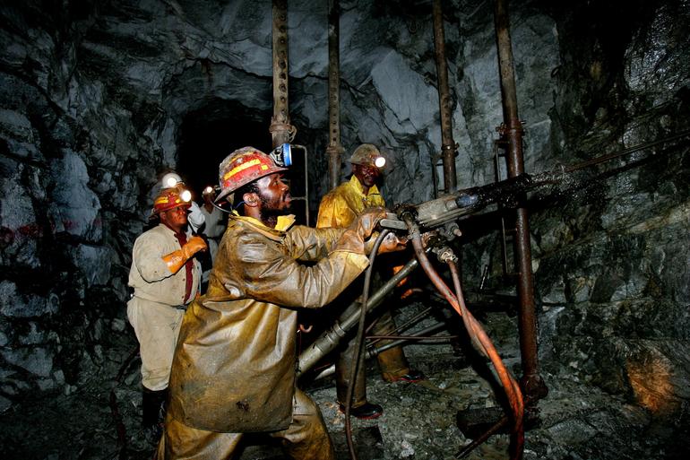 This file photo from Sept. 22, 2005, shows Gold miners working deep underground at Cooke Shaft near Johannesburg, South Africa. (Reuters Photo)