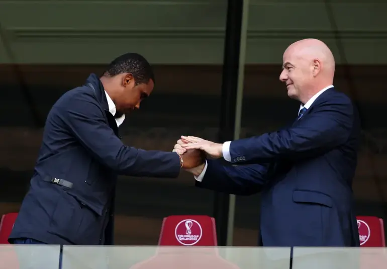 FIFA President Gianni Infantino with Samuel Eto’o before the 2022 World Cup match between Switzerland and Cameroon at Al Janoub Stadium. Stefan Matzke/Corbis/Getty Images