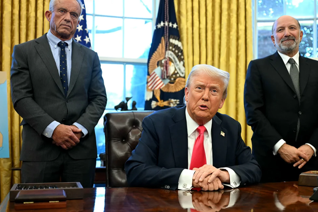 Donald Trump, US Secretary of Health and Human Services Robert F. Kennedy Jr. (L) and US Secretary of Commerce nominee Howard Lutnick (R), at the Oval Office of the White House in Washington, DC on February 25, 2025. Jim Watson/AFP/Getty Images