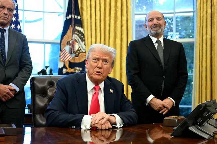 Donald Trump, US Secretary of Health and Human Services Robert F. Kennedy Jr. (L) and US Secretary of Commerce nominee Howard Lutnick (R), at the Oval Office of the White House in Washington, DC on February 25, 2025. Jim Watson/AFP/Getty Images