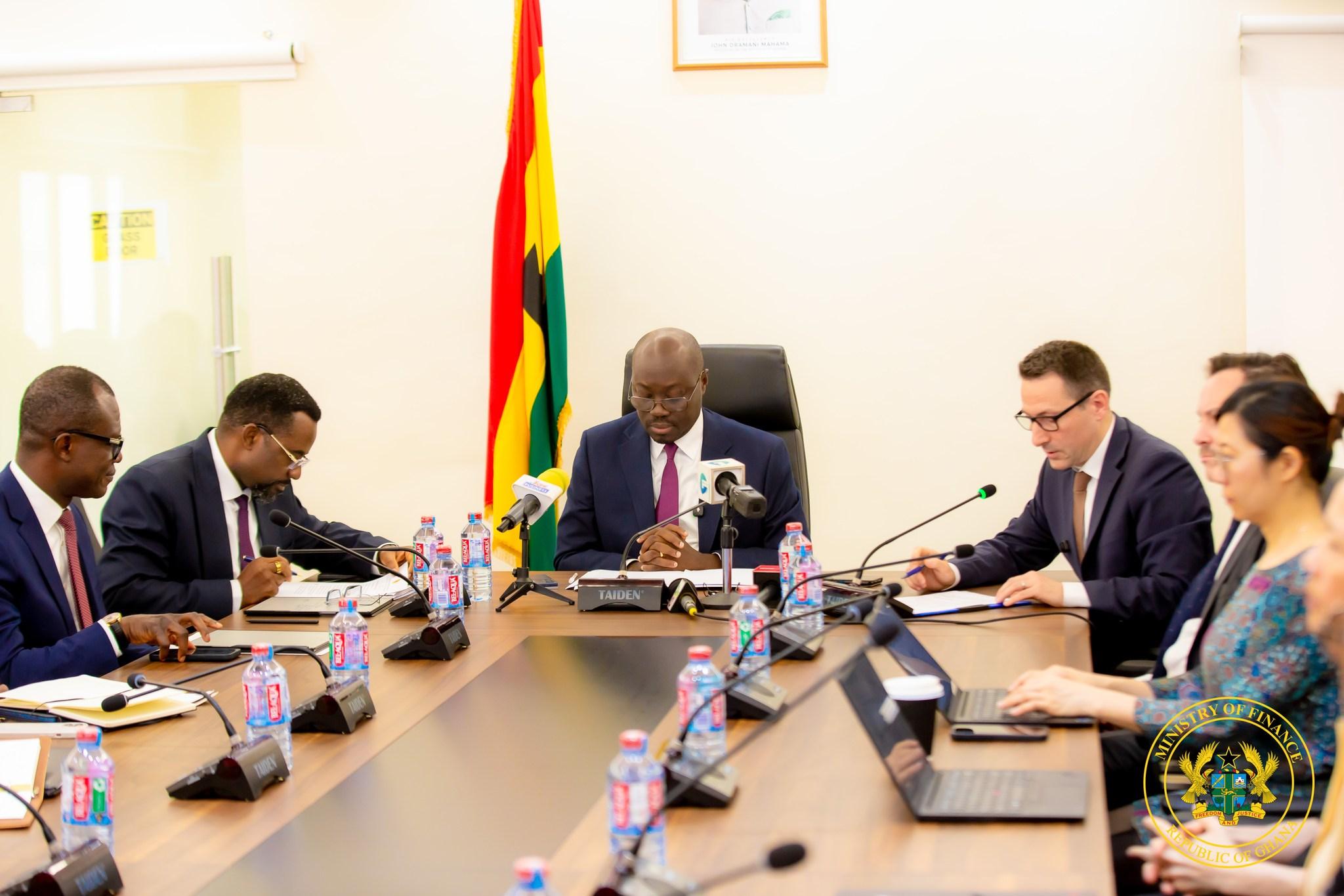 Dr Cassiel Ato Forson with IMF officials