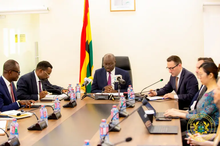 Dr Cassiel Ato Forson with IMF officials