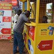 MoMAG directs mobile money agents to end cash-outs without customer presence
