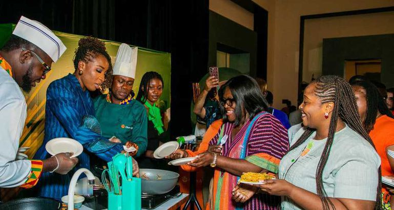 Flanked by two Chefs, Brand Ambassador, Naa Ashorkor is busy dishing hot samples of “First Choice” premium spaghetti for dealers and guests at the launch.  