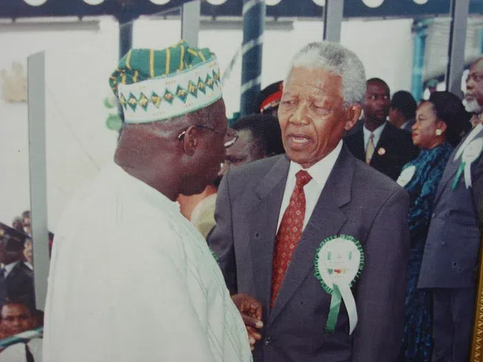 Nelson Mandela and General Olusegun Obasanjo. Image via nigerianeye.com