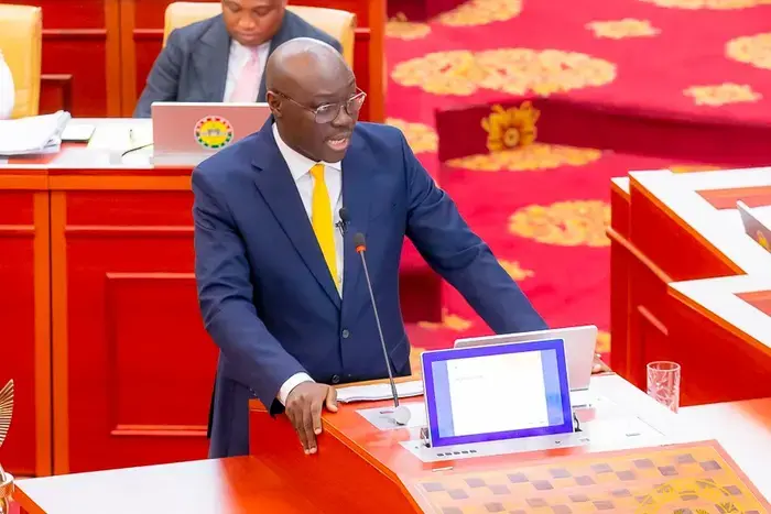 Dr Cassiel Ato Forson reading the Mid-year budget in Parliament