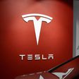 Tesla makes history as its first unsupervised full-self driving EVs navigate factory to dock