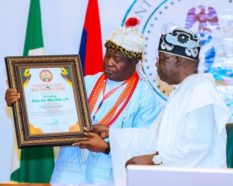 President Bola Tinubu and Umo Eno