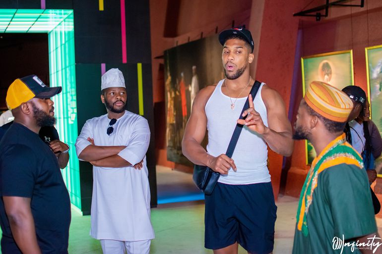 Anthony Joshua, former two-time heavyweight boxing champion, with Mr Idris Aregbe, Special Adviser to Gov. Babajide Sanwo-Olu on Tourism, Arts and Culture, at the John Randle Centre for Yoruba Culture and History, on Thursday in Lagos