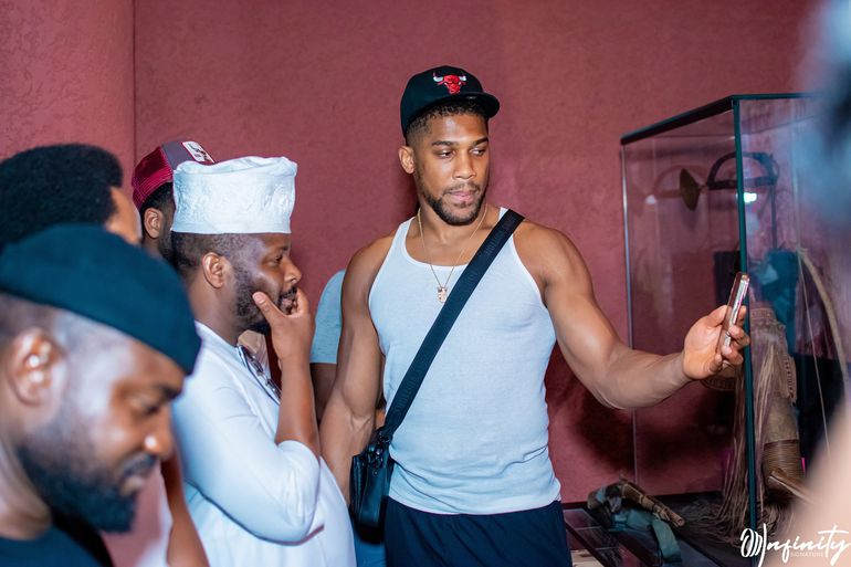 Anthony Joshua, former two-time heavyweight boxing champion, with Mr Idris Aregbe, Special Adviser to Gov. Babajide Sanwo-Olu on Tourism, Arts and Culture, at the John Randle Centre for Yoruba Culture and History, on Thursday in Lagos