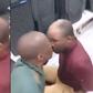 2 men forced to exchange kisses after being caught shoplifting