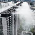 Rain falling from buildings to help combat rising heat in China is turning heads online (video)