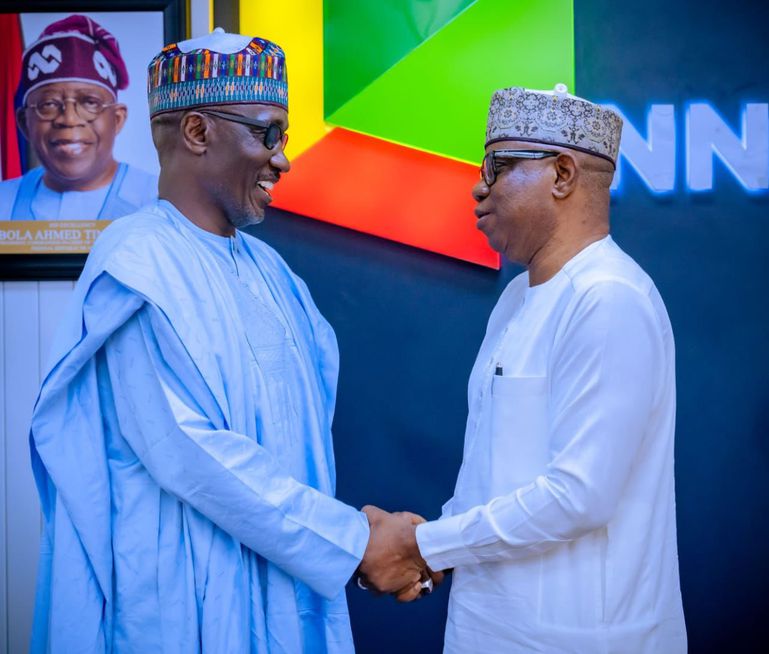 The new Group Chief Executive Officer of the Nigerian National Petroleum Company Limited (NNPC Ltd.), Bayo Ojulari (right) officially takes over from his predecessor, Mr Mele Kyari (left).