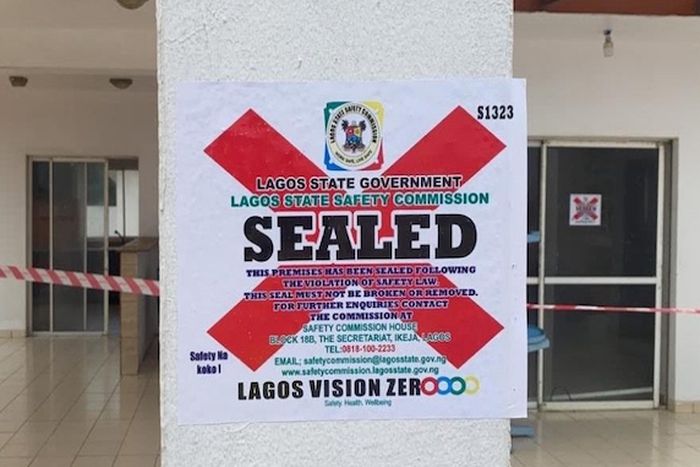 Official Lagos State Safety Commission "Sealed" notice posted on a building in Lekki following elevator safety violations.