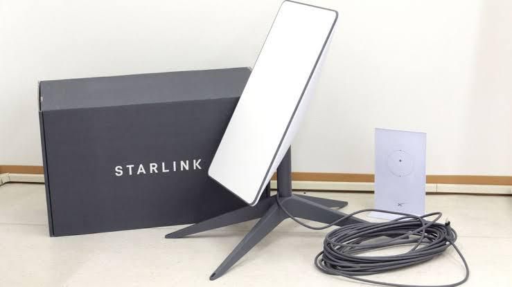 Starlink satellite dish kit with router and cables in the original Starlink box, showing the premium satellite internet hardware available in Nigeria