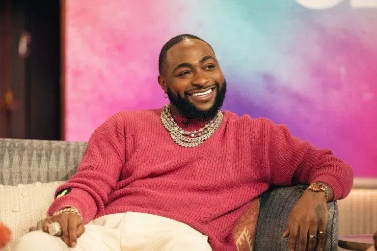 A joyful Davido during a 2026 media appearance discussing his career evolution and "5IVE" album cycle