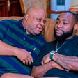 Davido in deep conversation with his uncle, Governor Ademola Adeleke, during a political strategy meeting in Osun State.