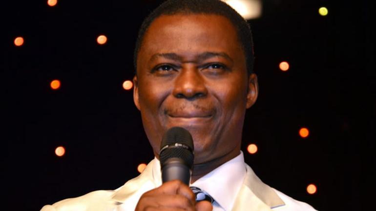 Dr. Daniel Olukoya, General Overseer of the Mountain of Fire and Miracles Ministries (MFM), preaching at a church service.
