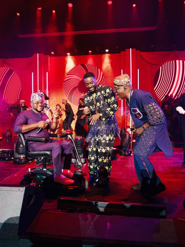 Adekunle Gold on stage with Yinka Ayefele and Adewale Ayuba