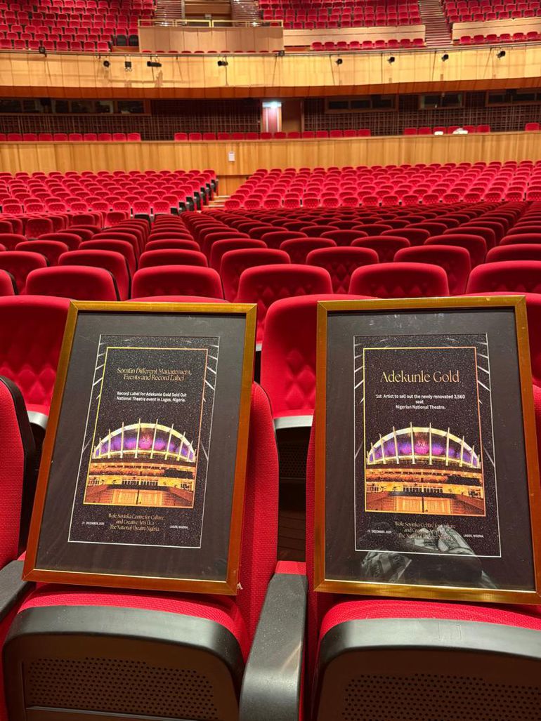 Adekunle Gold received plaques for selling out the renovated National Theatre