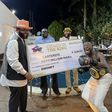 Carter Efe receives 50 million Naira cheque from E-Money after defeating Portable in Chaos in the Ring 4.
