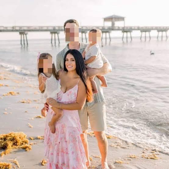 Holly Leeann Flores, her husband and their two children.